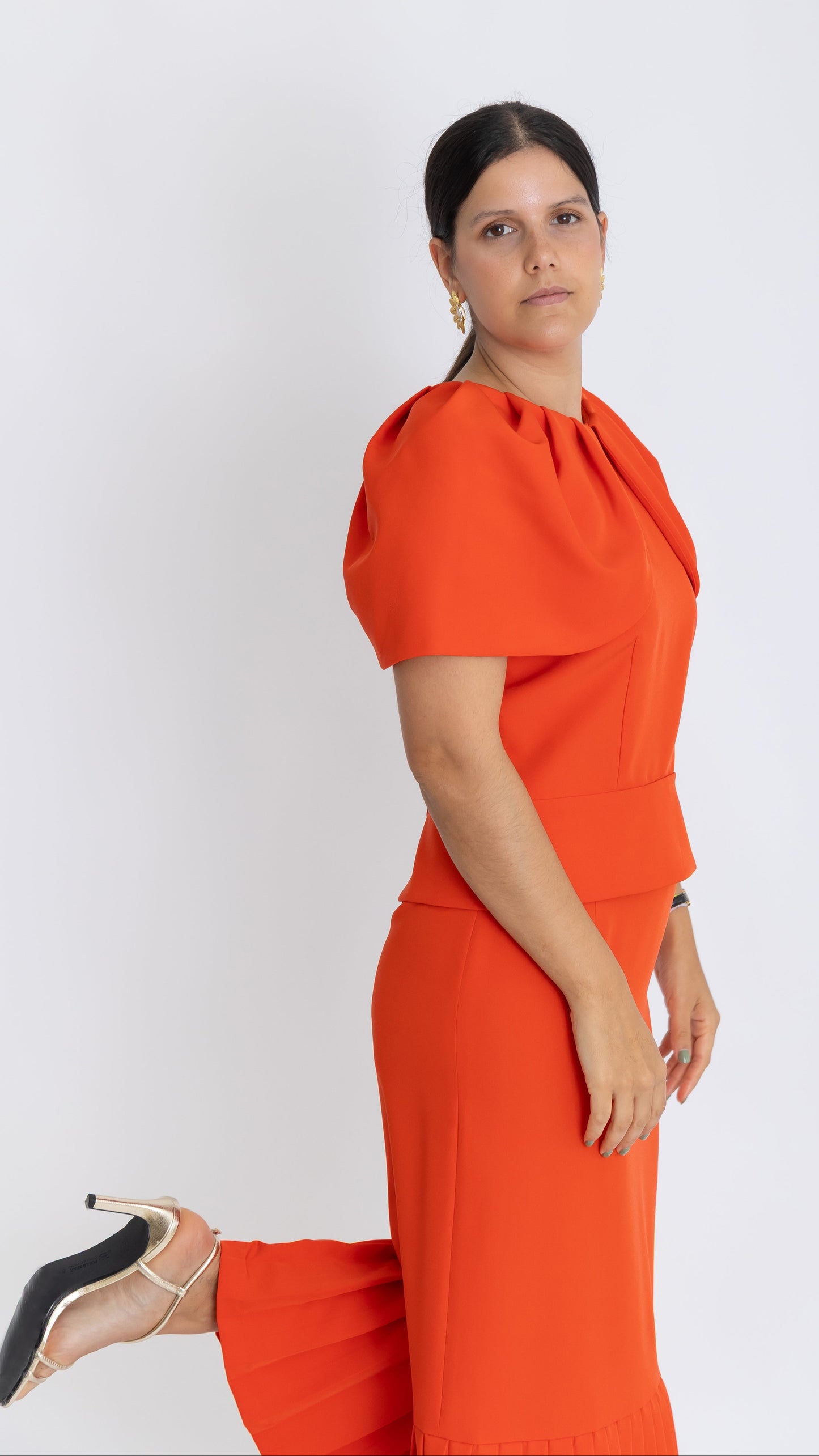 Conjunto Laranja com Blusa e Saia Plissada